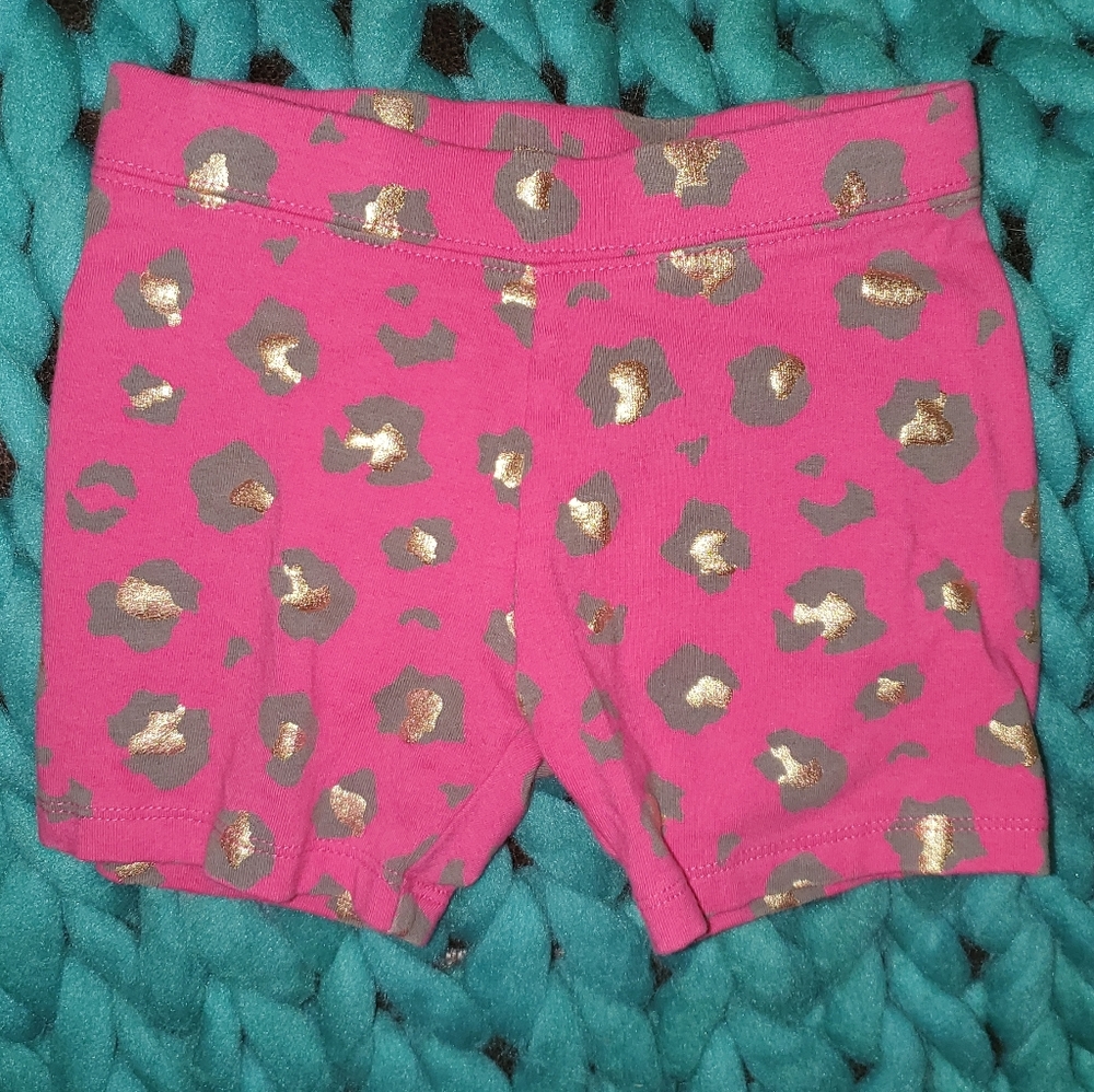 Pink and gold leopard print shorts